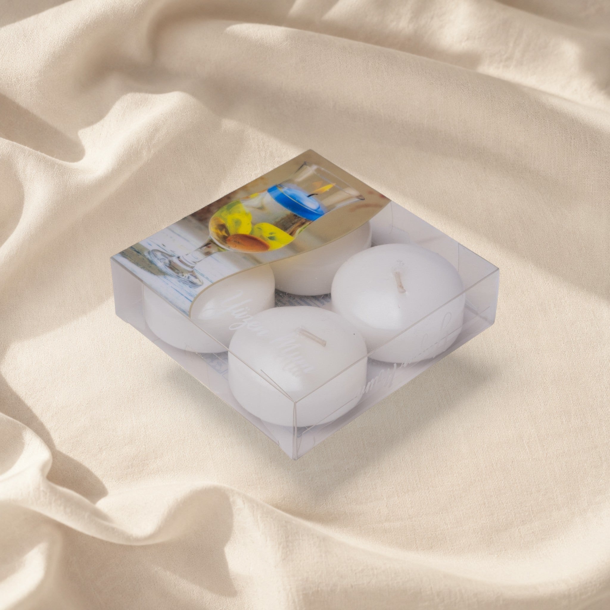 MUMSAN CANDLE 4'lü beyaz parafin yüzen mum seti, 5 cm çapında, 4-5 saat yanma süreli, asetat kutulu, dekoratif ve ambiyans aydınlatması için ideal.