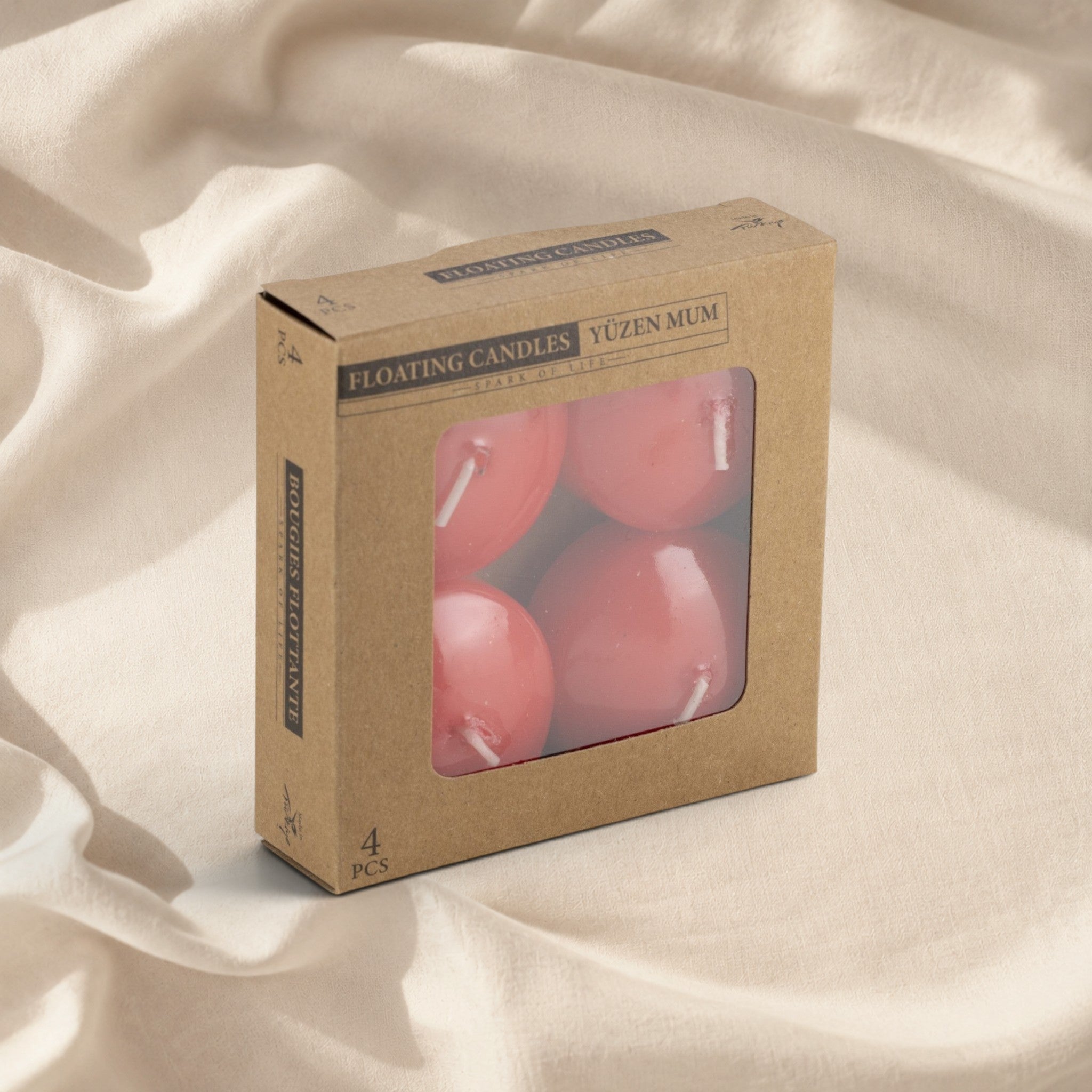 MUMSAN CANDLE 4'lü pembe yüzen mum seti, kraft kutuda, dekoratif ve uzun yanma süreli.