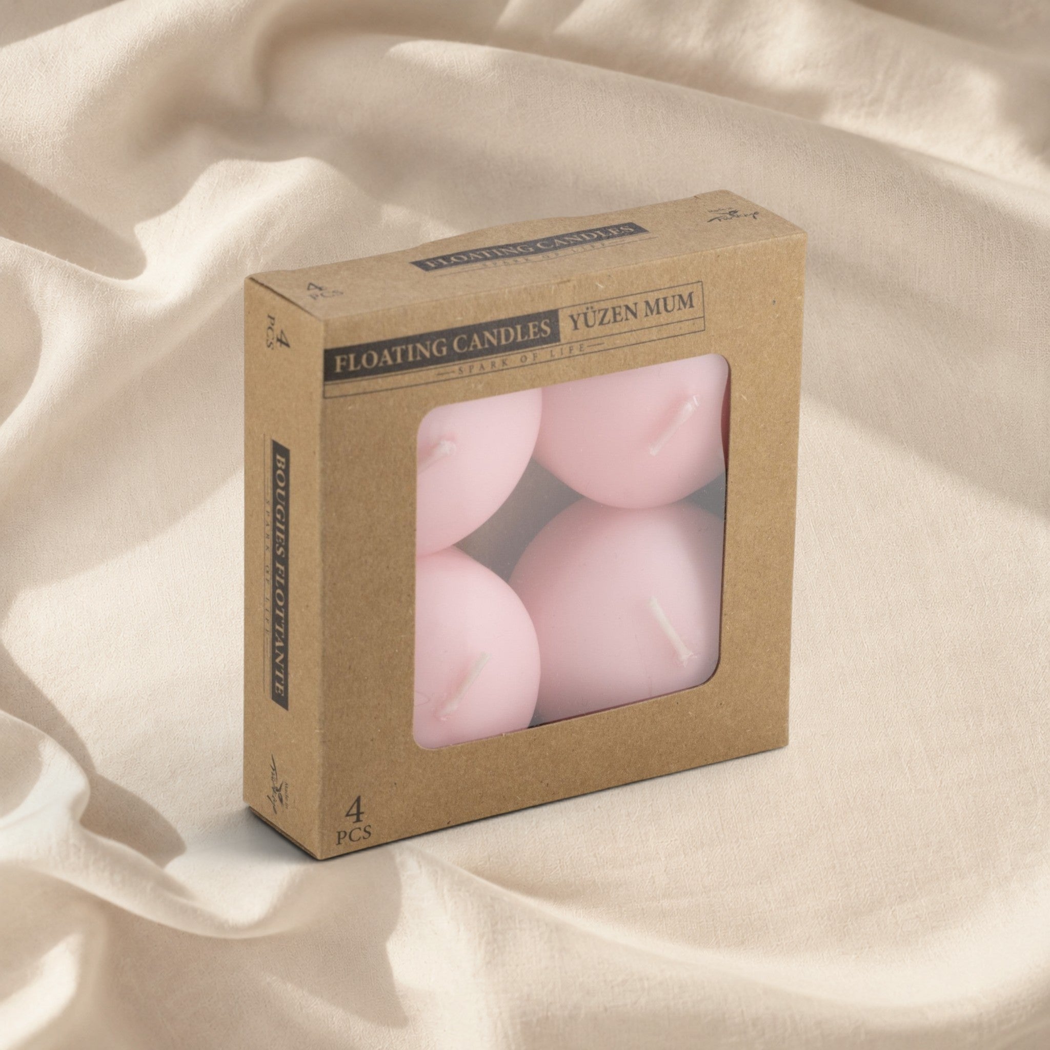 MUMSAN CANDLE 4'lü pembe yüzen mum seti, kraft kutuda, dekoratif ve uzun yanma süreli.