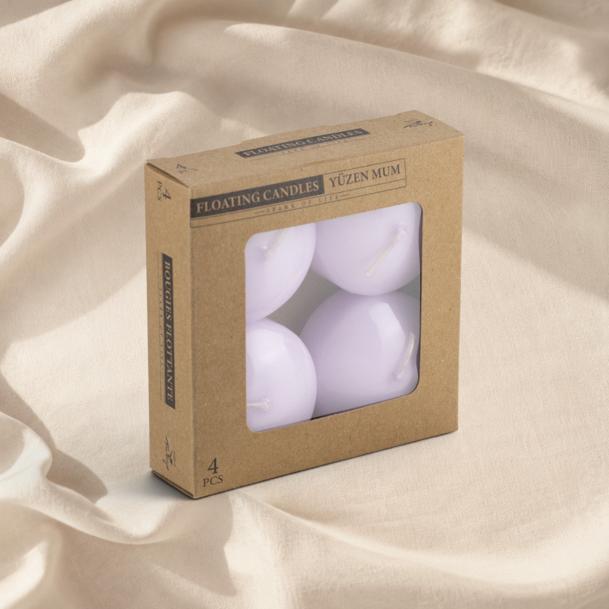 MUMSAN CANDLE 4'lü kraft kutuda açık mor yüzen mum seti. Dekoratif ve uzun süreli yanar.